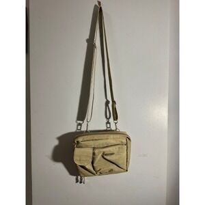 Baggallini tan crossbody belt bag pockets zippered compartments travel